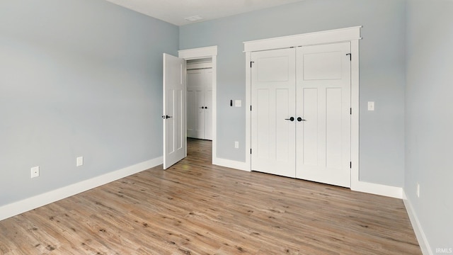 420 Catherwood Dr Unit 3, West Lafayette, IN 47906 - unfurnished bedroom featuring light wood finished floors and a closet