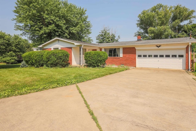 335 E State Road 58, Bedford, IN 47421 - view of front facade with brick siding, concrete driveway, an attached garage, a front yard, and a chimney
