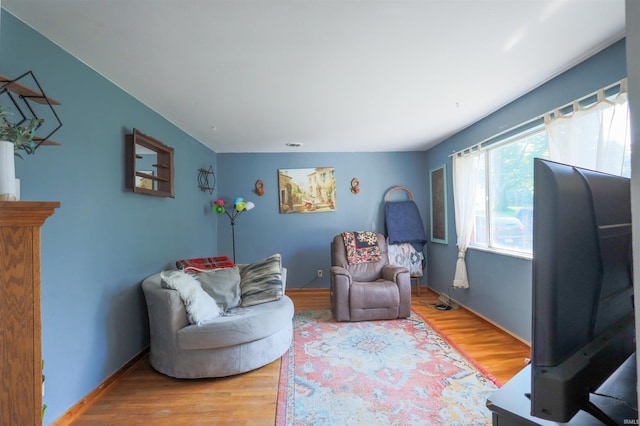 335 E State Road 58, Bedford, IN 47421 - living area featuring wood finished floors and baseboards