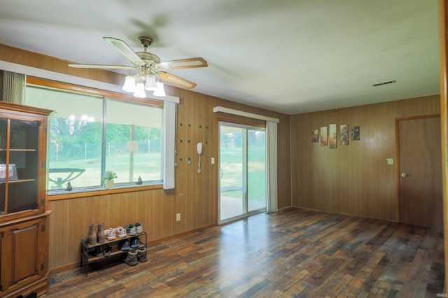 335 E State Road 58, Bedford, IN 47421 - unfurnished room with wood finished floors, ceiling fan, and wooden walls