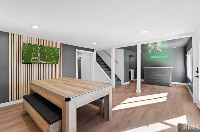 52354 Forestbrook Ave, South Bend, IN 46637 - dining space featuring stairs, wood finished floors, and recessed lighting
