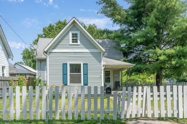 1114 W Monroe St, Kokomo, IN 46901 - bungalow-style house featuring a fenced front yard and roof with shingles