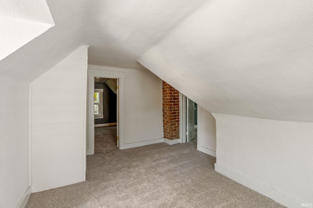 1114 W Monroe St, Kokomo, IN 46901 - bonus room featuring carpet and vaulted ceiling