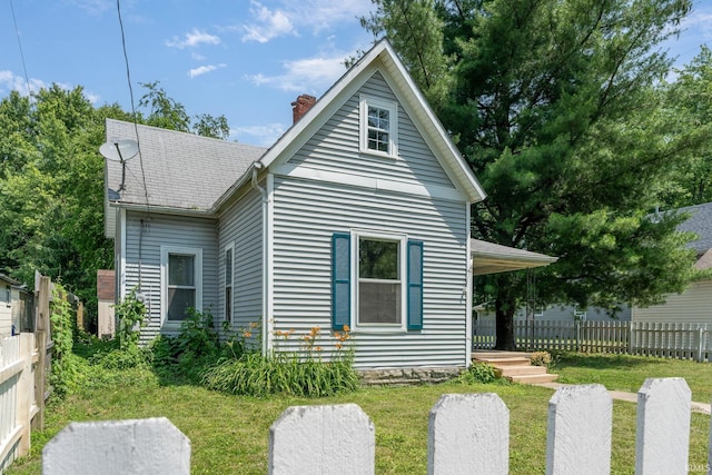 1114 W Monroe St, Kokomo, IN 46901 - view of front facade with a chimney