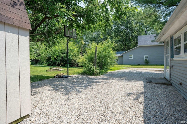 1114 W Monroe St, Kokomo, IN 46901 - view of green lawn with view of wooded area
