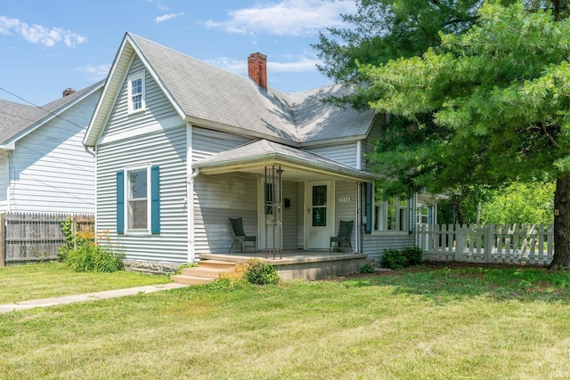 1114 W Monroe St, Kokomo, IN 46901 - view of front of home featuring covered porch and a chimney