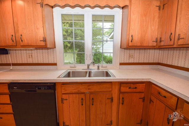 3209 E Kendall Ln, Muncie, IN 47303 - kitchen featuring black dishwasher, wallpapered walls, light countertops, and brown cabinets