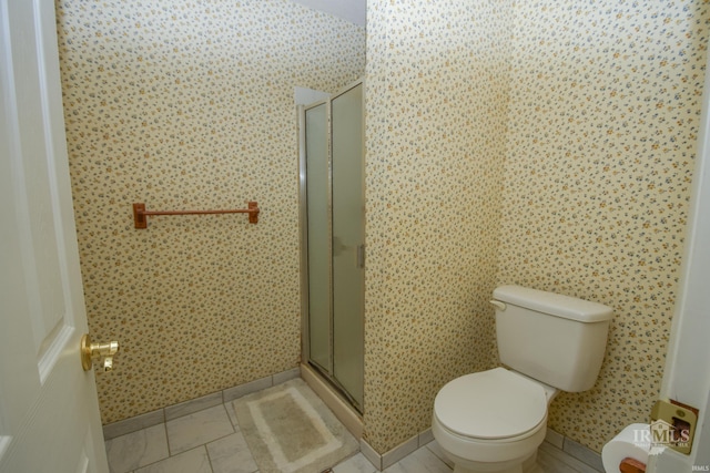 3209 E Kendall Ln, Muncie, IN 47303 - full bathroom with a stall shower and wallpapered walls