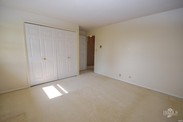 3209 E Kendall Ln, Muncie, IN 47303 - unfurnished bedroom with carpet and a closet