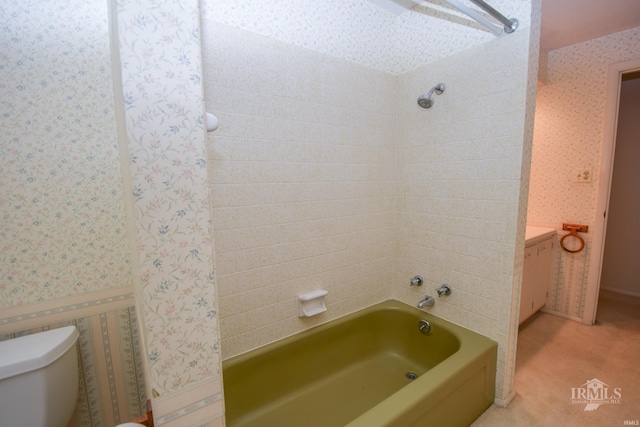 3209 E Kendall Ln, Muncie, IN 47303 - full bath with wallpapered walls, shower / washtub combination, and vanity