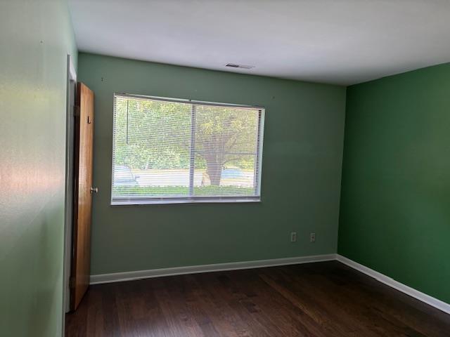 2500 Topsfield Rd Unit 907, South Bend, IN 46614 - unfurnished room with wood finished floors and baseboards