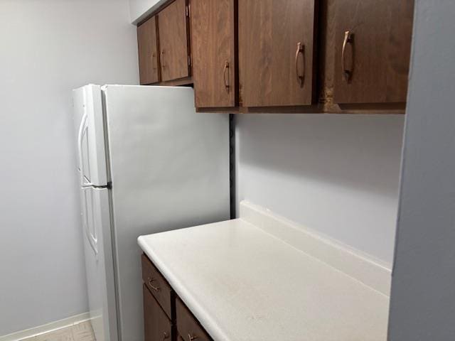 2500 Topsfield Rd Unit 907, South Bend, IN 46614 - kitchen featuring freestanding refrigerator and light countertops