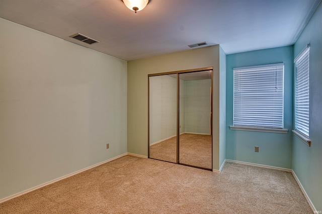 5813 Polo Run, Evansville, IN 47715 - unfurnished bedroom featuring carpet flooring and a closet