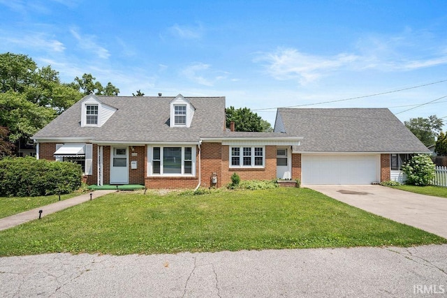 2222 S Indiana Ave, Kokomo, IN 46902 - cape cod-style house with brick siding and a front yard