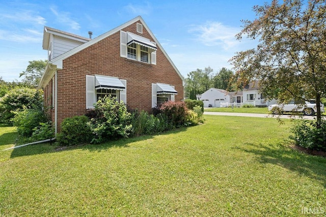 2222 S Indiana Ave, Kokomo, IN 46902 - view of side of property with brick siding and a yard