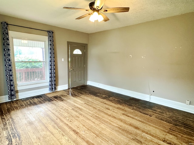 203 E Church St, Milroy, IN 46156 - entryway featuring wood finished floors and ceiling fan