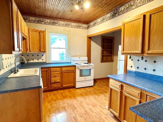 203 E Church St, Milroy, IN 46156 - kitchen featuring white appliances, wood ceiling, light wood finished floors, dark countertops, and tasteful backsplash