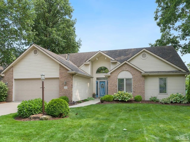 2133 Blue Harbor Dr, Fort Wayne, IN 46804 - view of front facade with brick siding, an attached garage, a front yard, a shingled roof, and concrete driveway
