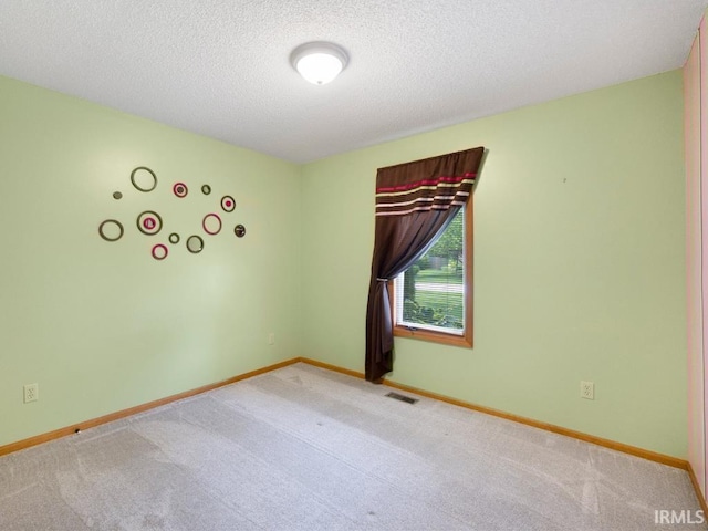 2133 Blue Harbor Dr, Fort Wayne, IN 46804 - carpeted empty room with baseboards and a textured ceiling