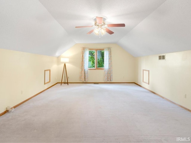 2133 Blue Harbor Dr, Fort Wayne, IN 46804 - additional living space featuring carpet floors, lofted ceiling, and a ceiling fan