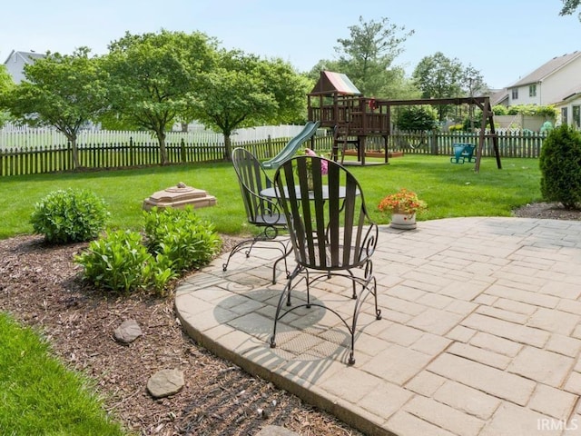 2133 Blue Harbor Dr, Fort Wayne, IN 46804 - fenced backyard featuring a playground and a patio area
