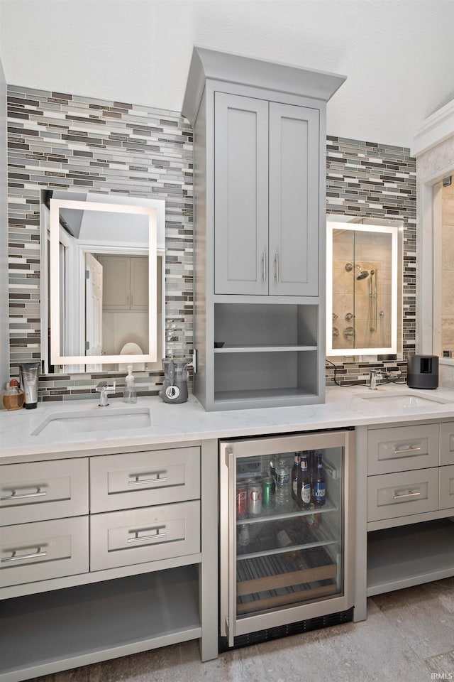 4416 Lakeshore Dr, Kokomo, IN 46902 - bar with beverage cooler and decorative backsplash
