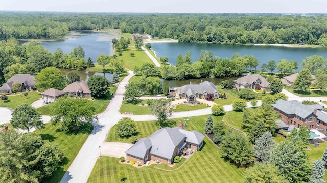 4416 Lakeshore Dr, Kokomo, IN 46902 - drone / aerial view of a nearby body of water and a heavily wooded area