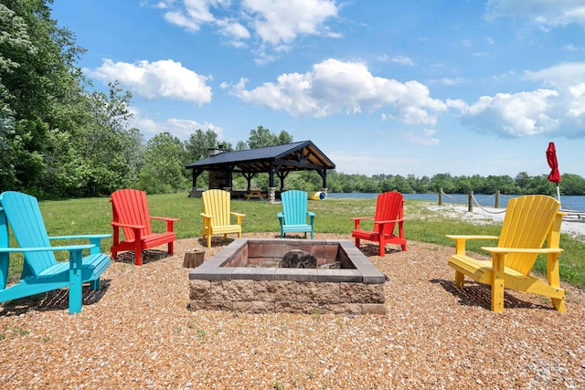 4416 Lakeshore Dr, Kokomo, IN 46902 - view of green lawn with a fire pit and a gazebo