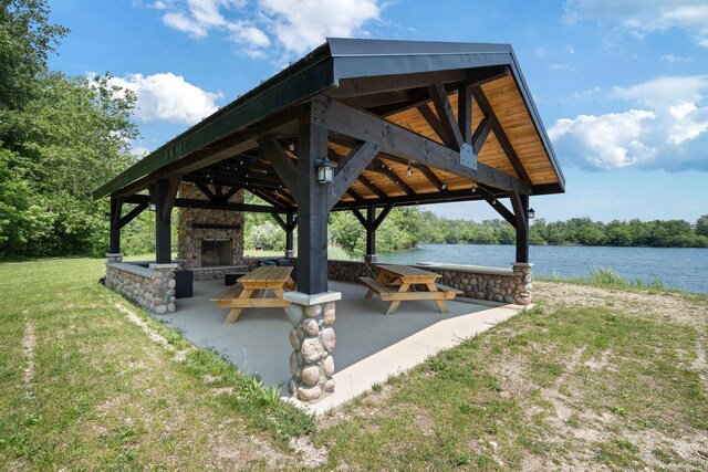 4416 Lakeshore Dr, Kokomo, IN 46902 - surrounding community featuring a gazebo, a lawn, a water view, and a patio