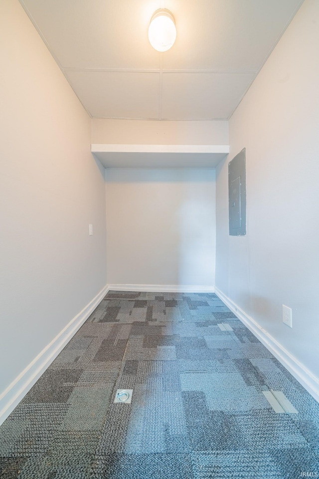 921 Race St, Logansport, IN 46947 - carpeted spare room with electric panel and baseboards