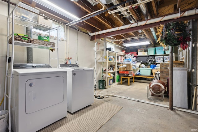 439E 17th St, Mishawaka, IN 46544 - unfinished below grade area with washer and clothes dryer and concrete block wall