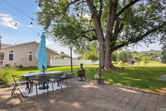 439E 17th St, Mishawaka, IN 46544 - view of patio with a playground and outdoor dining space