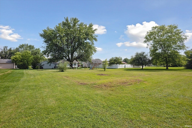 439E 17th St, Mishawaka, IN 46544 - view of green lawn with a playground