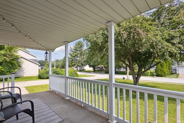 439E 17th St, Mishawaka, IN 46544 - covered porch with a lawn