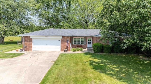 3076 N 450 Rd E, Logansport, IN 46947 - ranch-style house with an attached garage, driveway, a front yard, brick siding, and roof with shingles