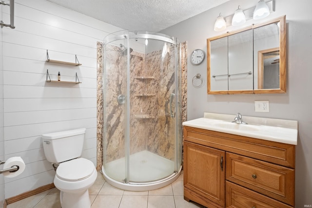 3076 N 450 Rd E, Logansport, IN 46947 - full bathroom featuring vanity, a shower stall, tile patterned floors, and a textured ceiling