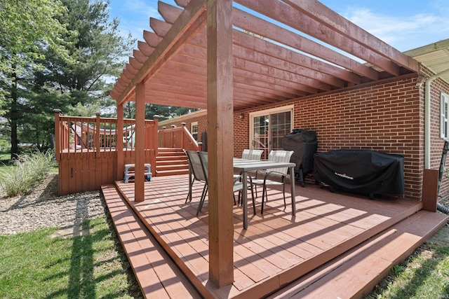3076 N 450 Rd E, Logansport, IN 46947 - wooden terrace featuring area for grilling, a pergola, and outdoor dining space