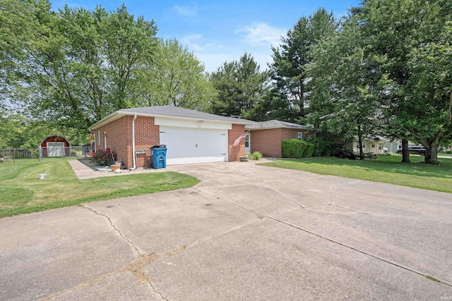 3076 N 450 Rd E, Logansport, IN 46947 - view of home's exterior featuring brick siding, a lawn, driveway, and a garage