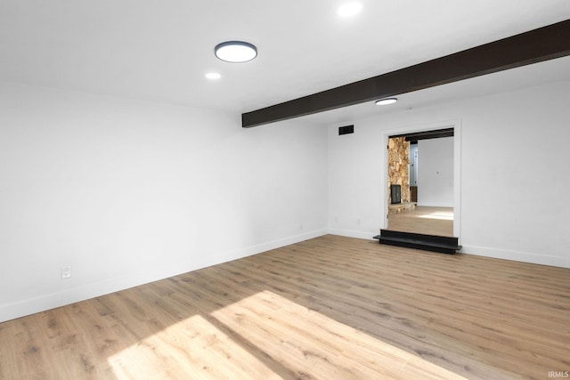 5228 N Lee Ct, South Bend, IN 46614 - empty room with beam ceiling, recessed lighting, and wood finished floors