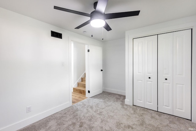 5228 N Lee Ct, South Bend, IN 46614 - unfurnished bedroom with carpet flooring, a closet, and ceiling fan