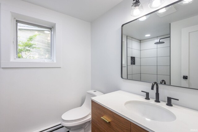 5228 N Lee Ct, South Bend, IN 46614 - bathroom with vanity, tiled shower, and baseboard heating