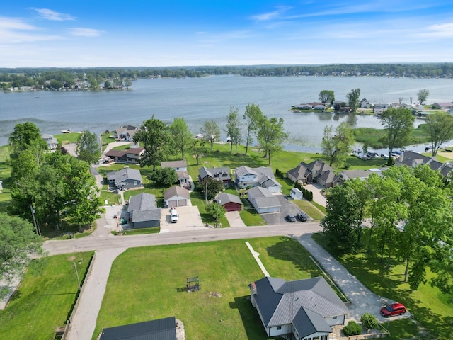1791 Chapman Lake Dr, Warsaw, IN 46582 - aerial view of property and surrounding area with a large body of water and nearby suburban area