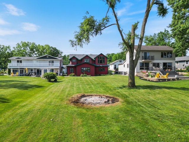 1791 Chapman Lake Dr, Warsaw, IN 46582 - view of green lawn with a balcony
