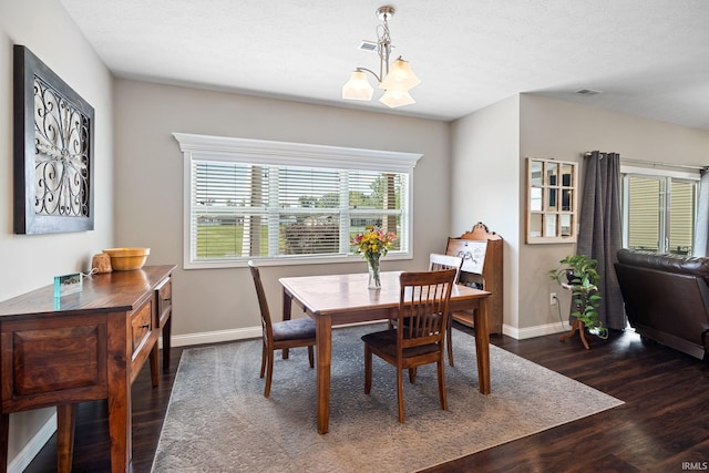 1869 Paloma Ct, Lafayette, IN 47909 - dining space featuring a chandelier and dark wood-type flooring