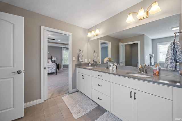 1869 Paloma Ct, Lafayette, IN 47909 - ensuite bathroom featuring double vanity and baseboards