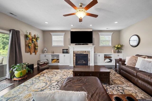 1869 Paloma Ct, Lafayette, IN 47909 - living area with ceiling fan, a stone fireplace, dark wood finished floors, and recessed lighting