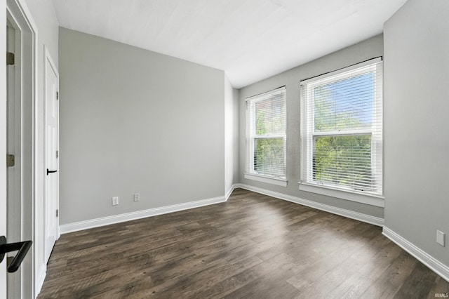 112 W Washington Blvd Unit 329, Fort Wayne, IN 46802 - empty room featuring baseboards and dark wood-style floors