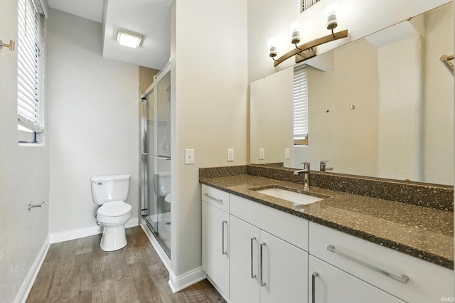 112 W Washington Blvd Unit 329, Fort Wayne, IN 46802 - bathroom featuring vanity, wood finished floors, and a stall shower