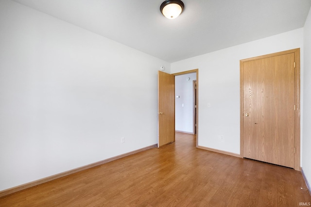 3610 E Sherwood Ter, Fort Wayne, IN 46806 - unfurnished bedroom featuring wood finished floors