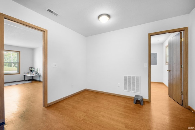 3610 E Sherwood Ter, Fort Wayne, IN 46806 - empty room featuring wood finished floors and baseboards